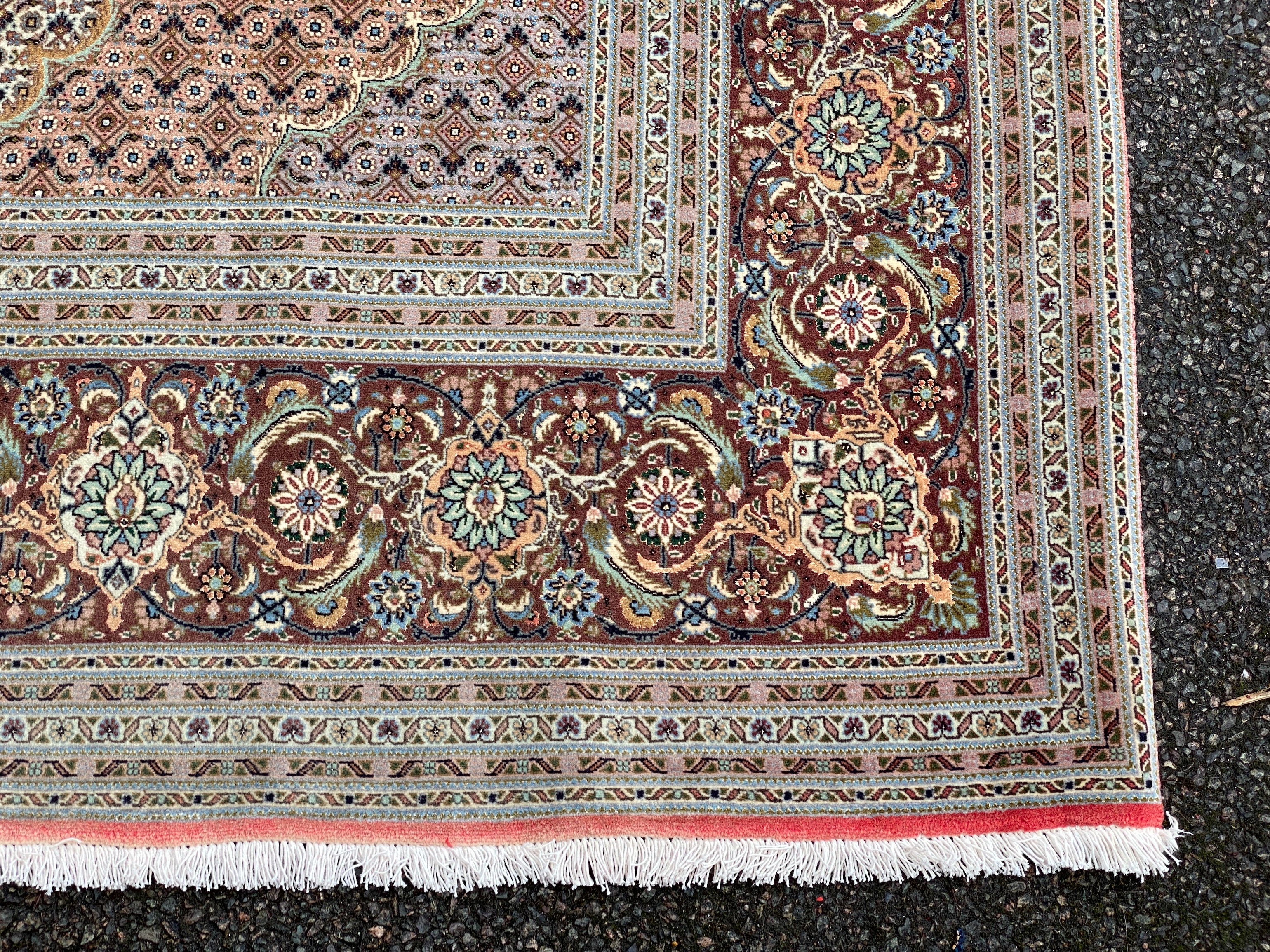 A Persian part silk Tabriz carpet, 350 x 248cm